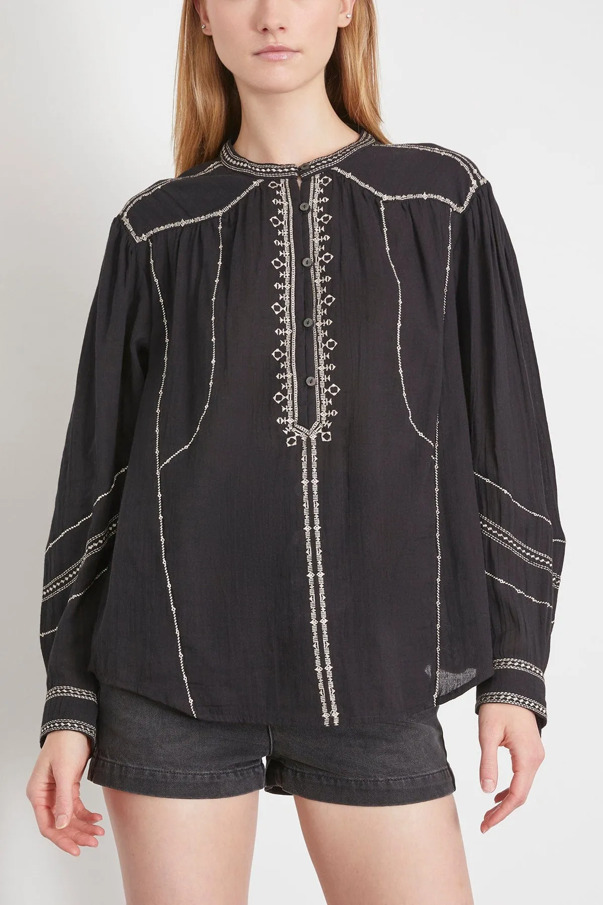 Sure! Heres an optimized title with modifiers: 

Chic Black Pelson Top - Sleek, Comfortable, and Versatile Womens Blouse